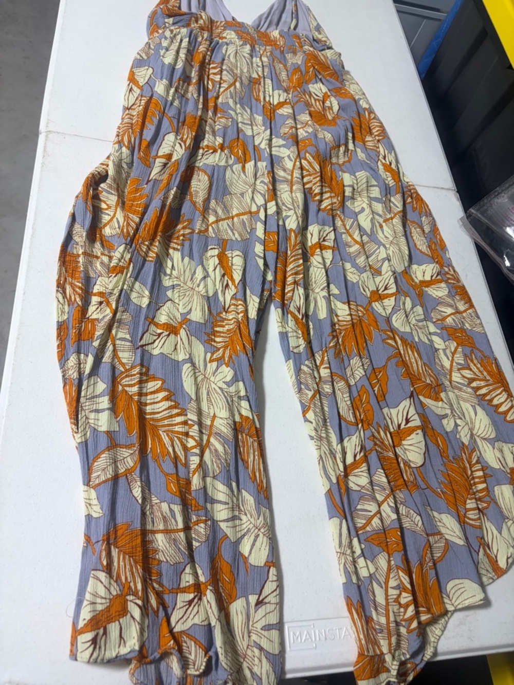 Lush Lavender Wide-Leg Jumpsuit with Orange and Cream Leaf Print